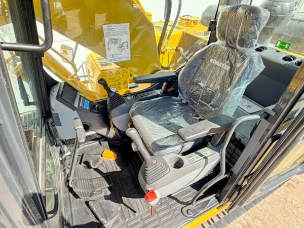 Komatsu PC210‑10M0 excavator
