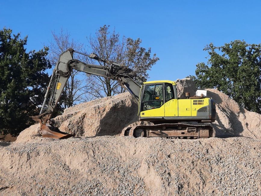 excavator construction site — professional stock image